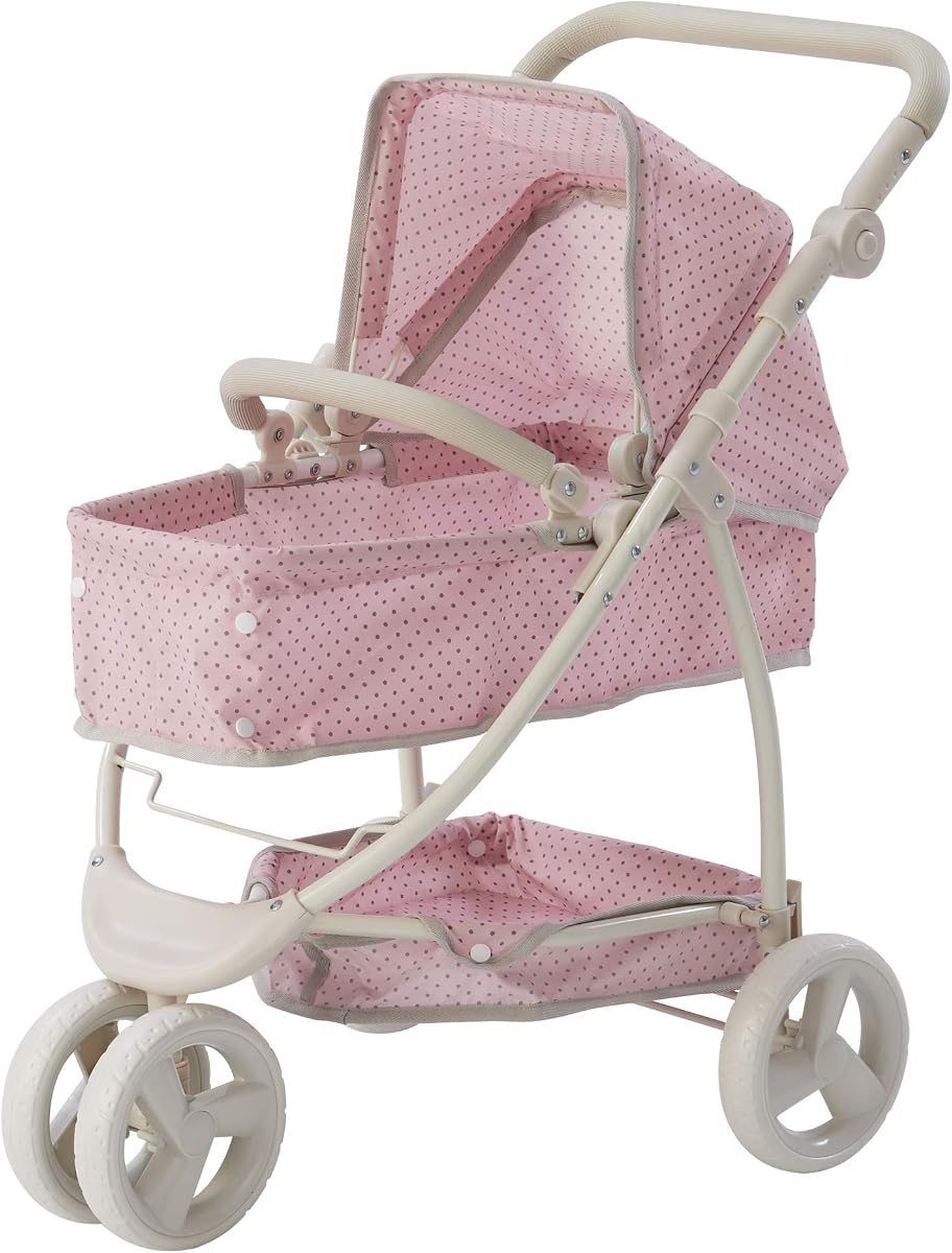 Cream and pink convertible baby doll stroller with gray polka dots and all-terrain wheels